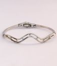 Touchstone Wavy Silver Polished Bangle Style AD Bracelet
