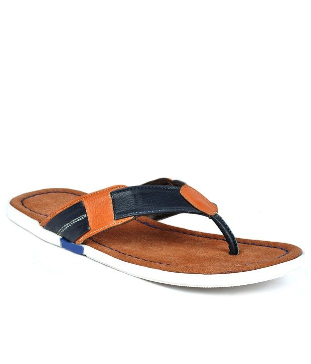 tan and black flip flops