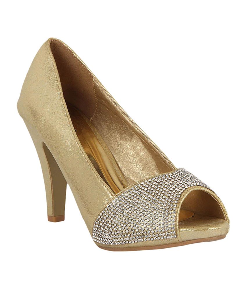 gold leather pumps