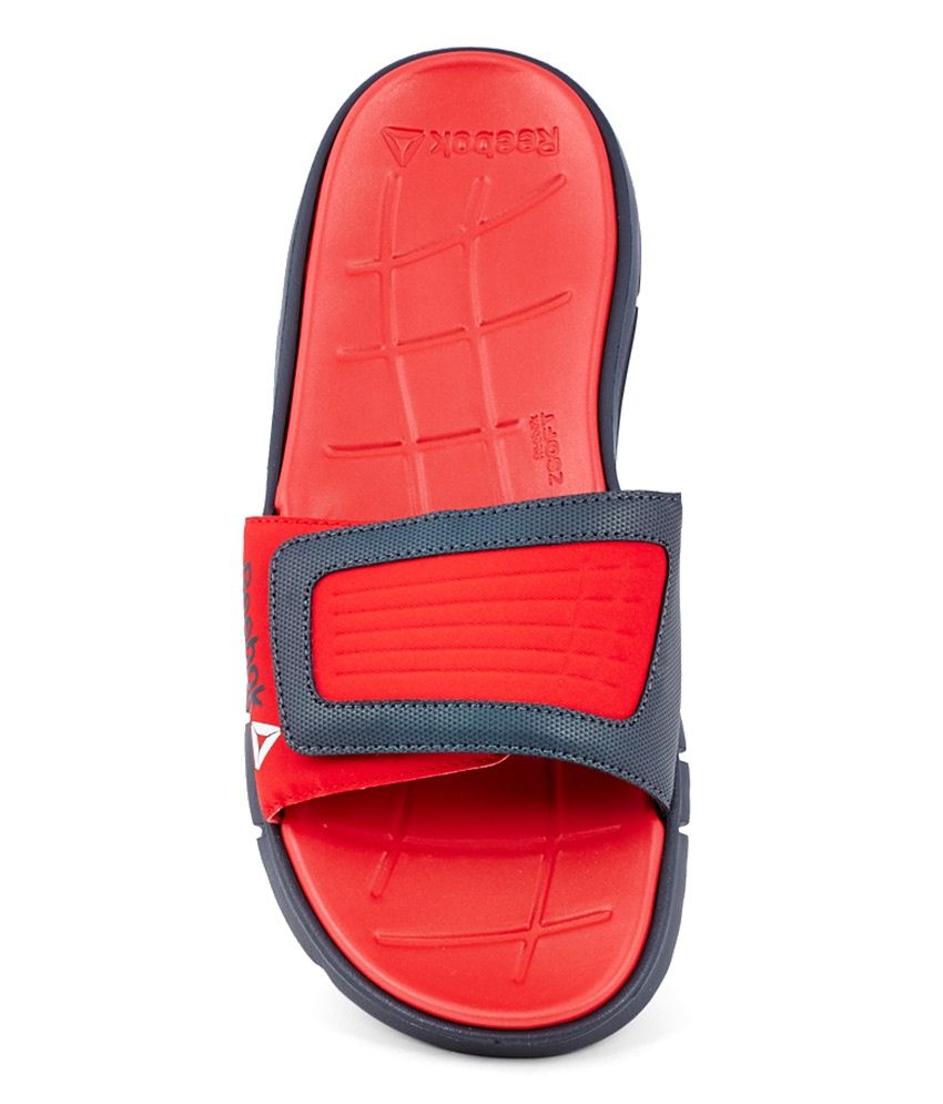 red reebok slides