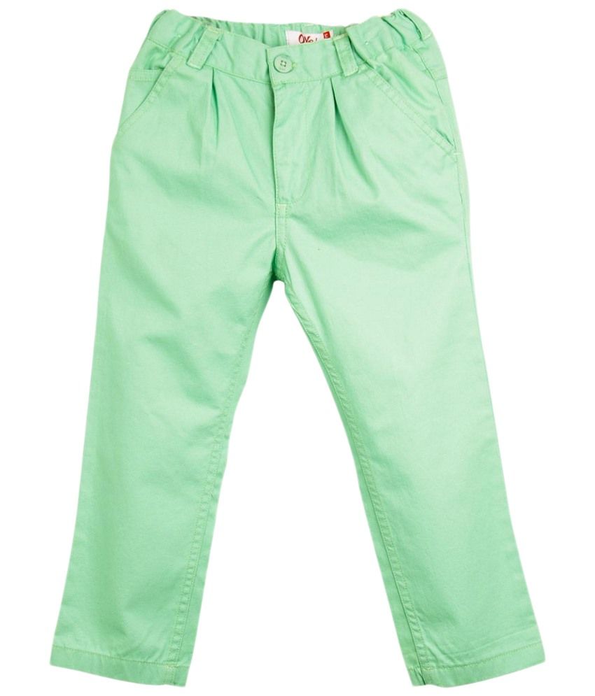green pleated pants