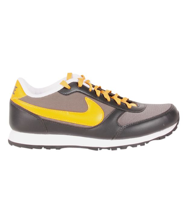 yellow and black shoes nike