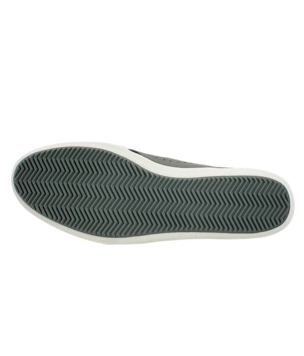 navy blue and gray nike shoes
