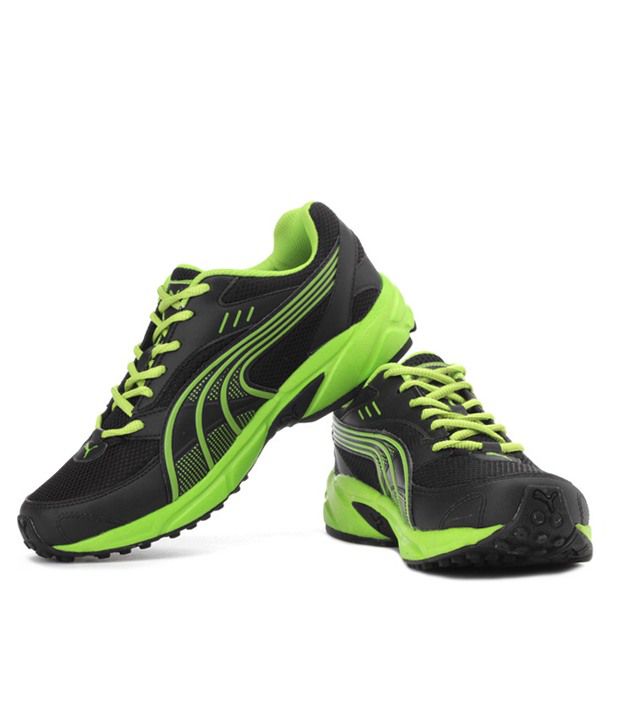 puma green sports shoes