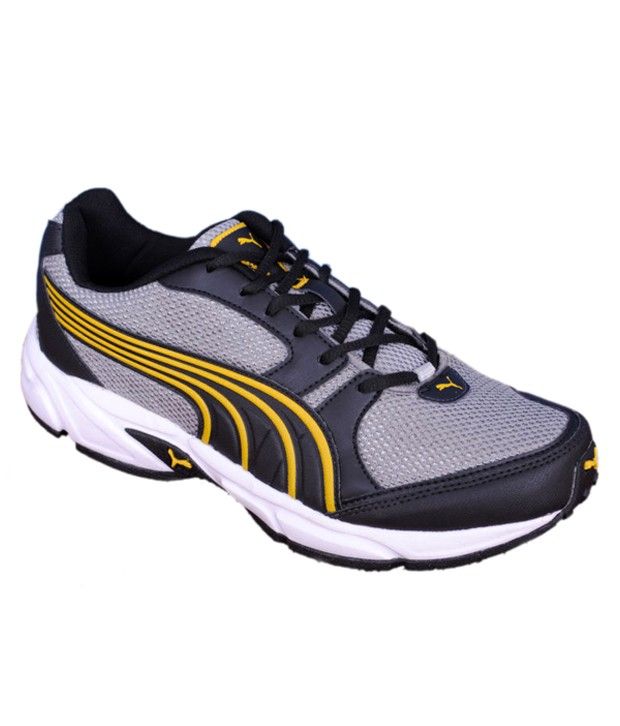 yellow and gray pumas