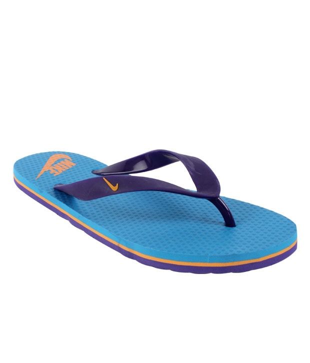 purple nike flip flops