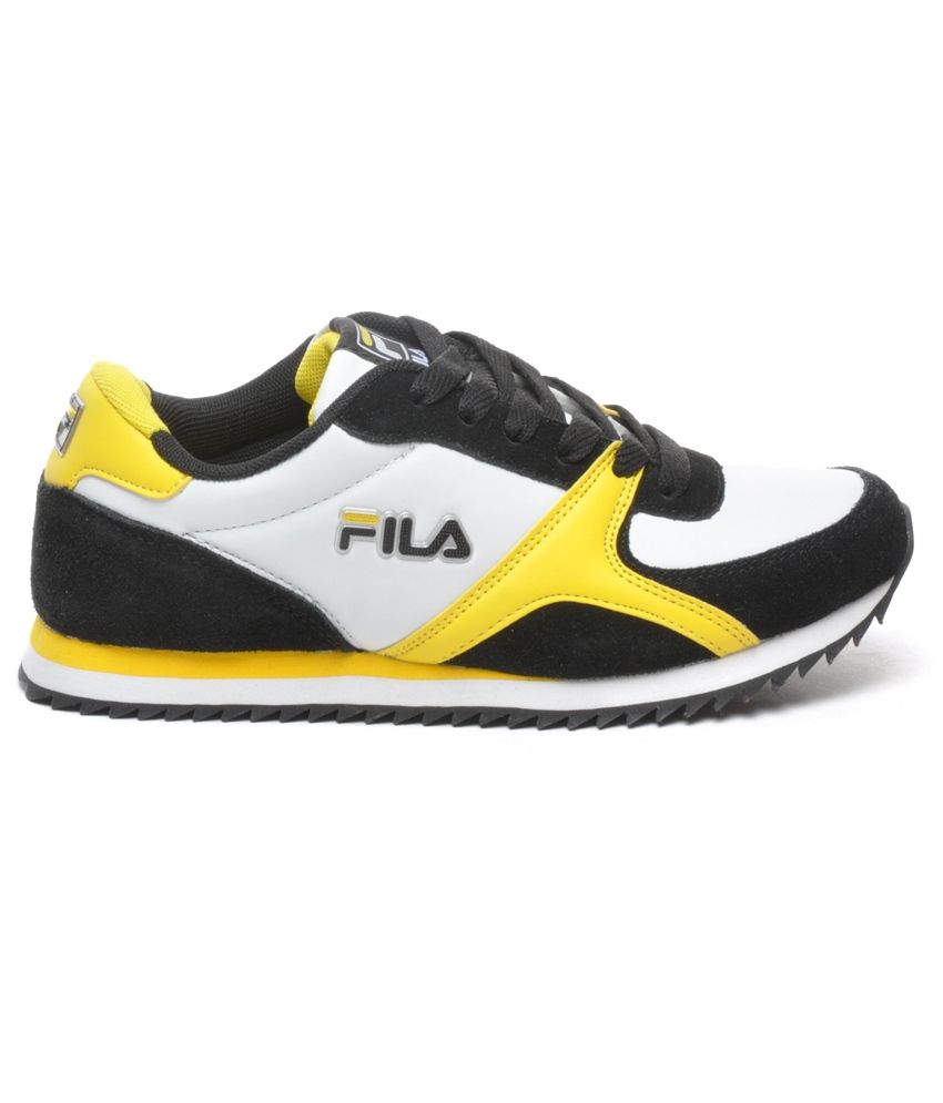 black and yellow fila shoes