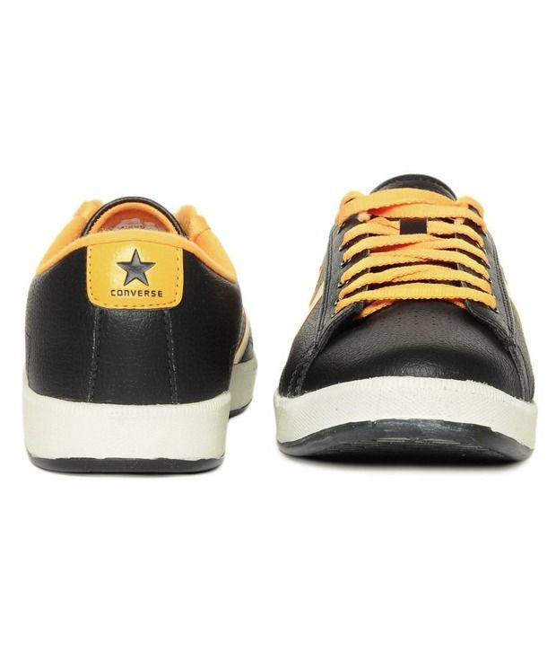 black and yellow leather converse