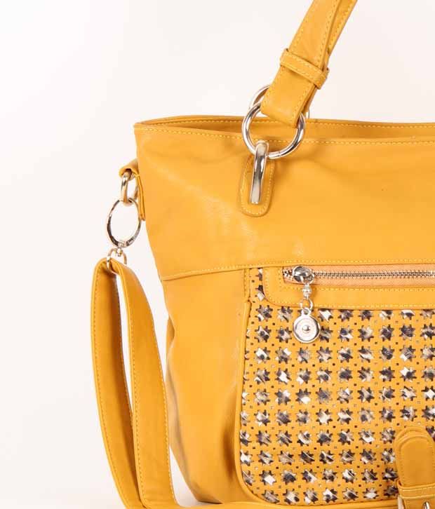 1 To All Bags Mustard Yellow With A Beautiful Cut Work Design 1 To All Bags Mustard Yellow With A Beautiful Cut Work Design Pocket Classy Handbag
