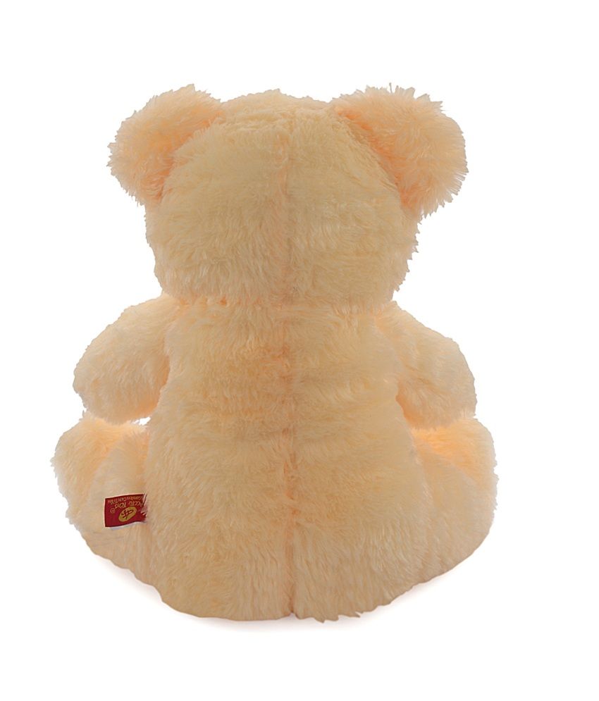 peach color teddy bear