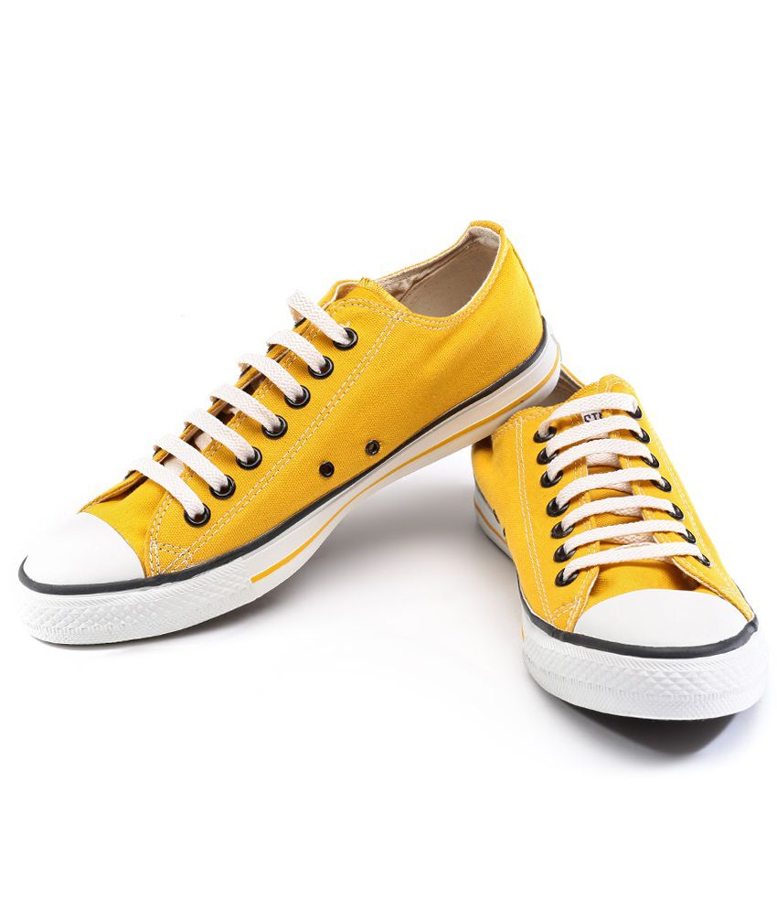 mustard colored converse