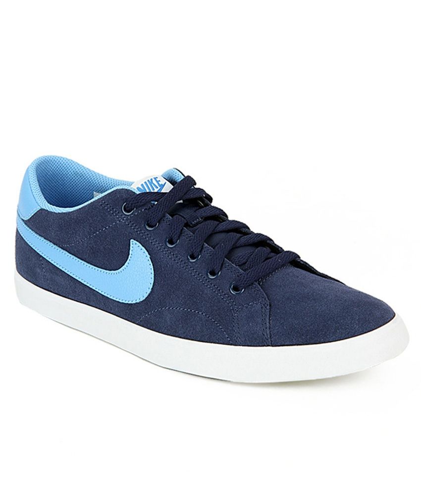 solid blue nike shoes