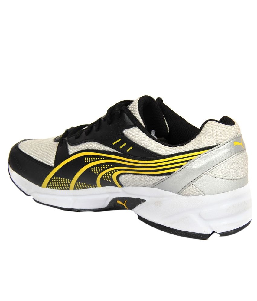 puma black and white shoe