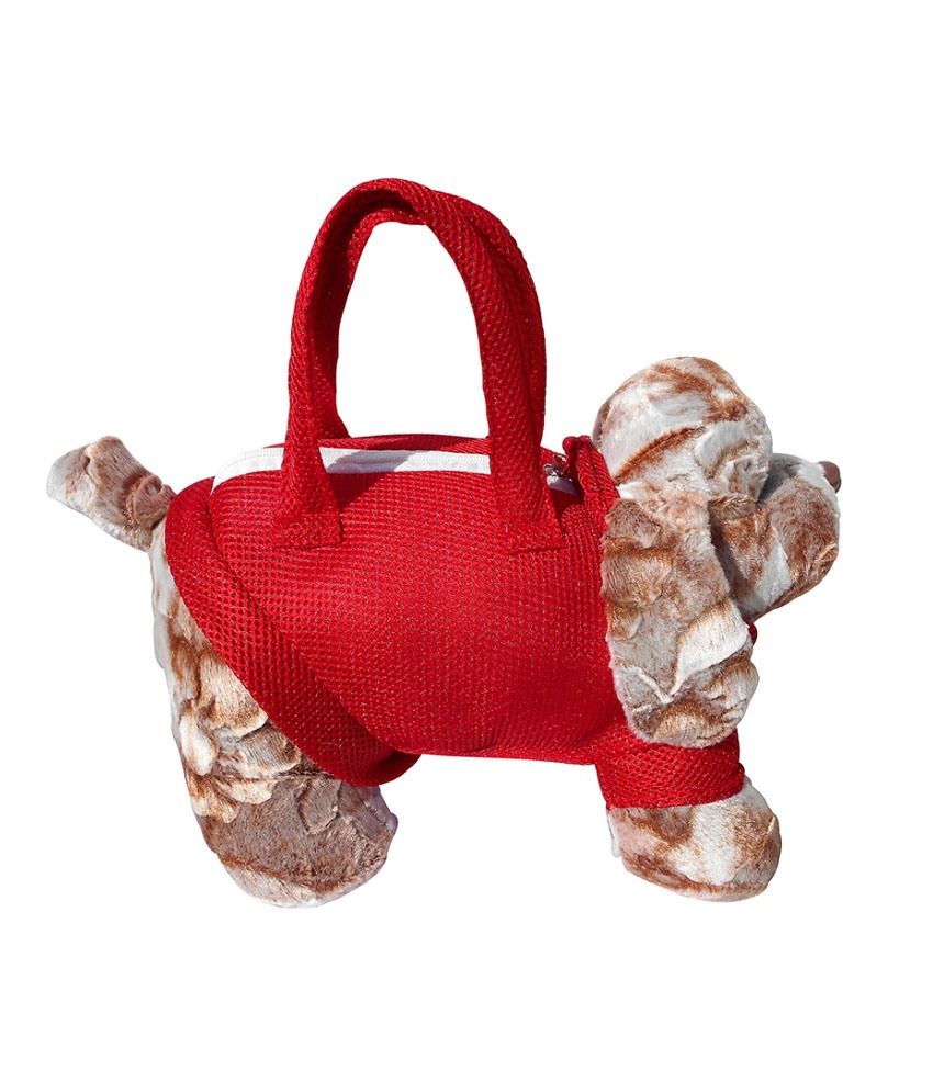 soft toy dog in handbag