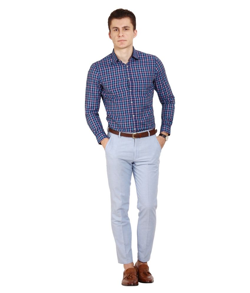 blue check shirt with black pants