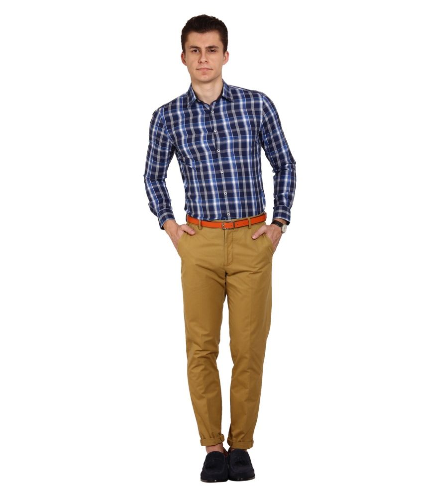 blue check shirt with black pants