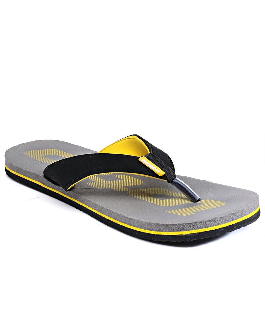 grey and yellow slippers