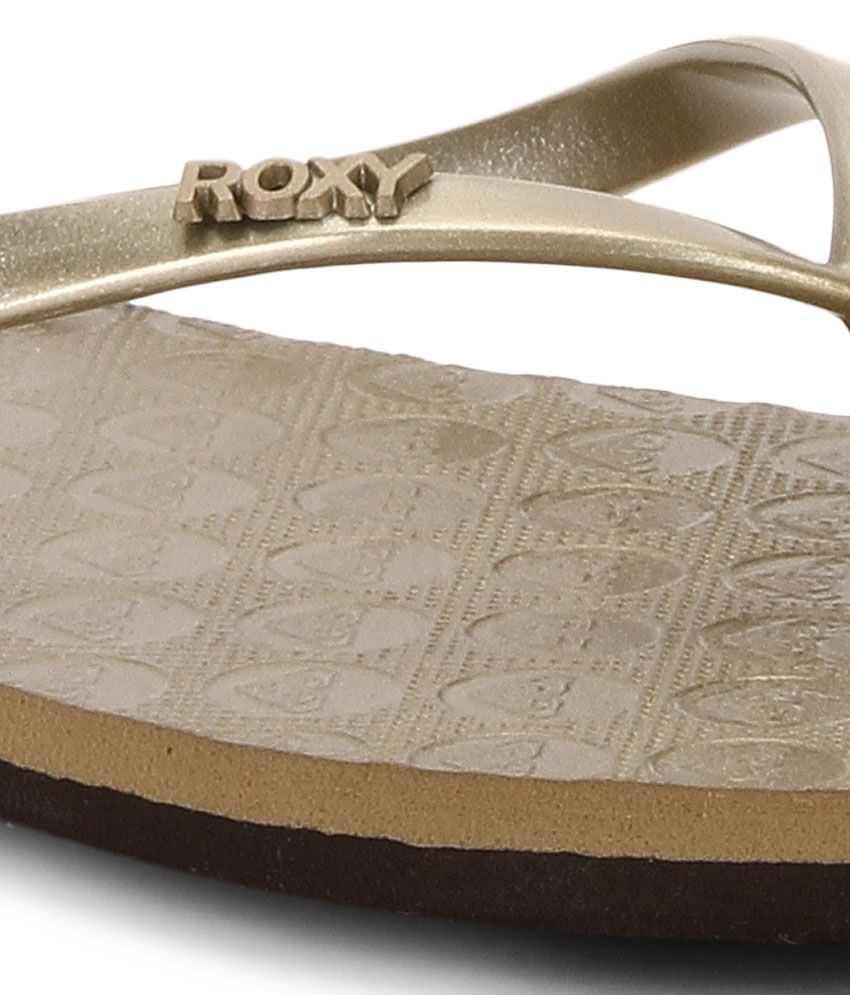 roxy gold flip flops