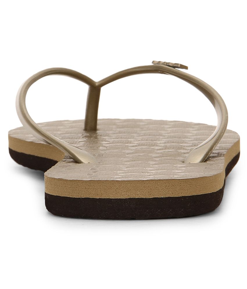roxy gold flip flops