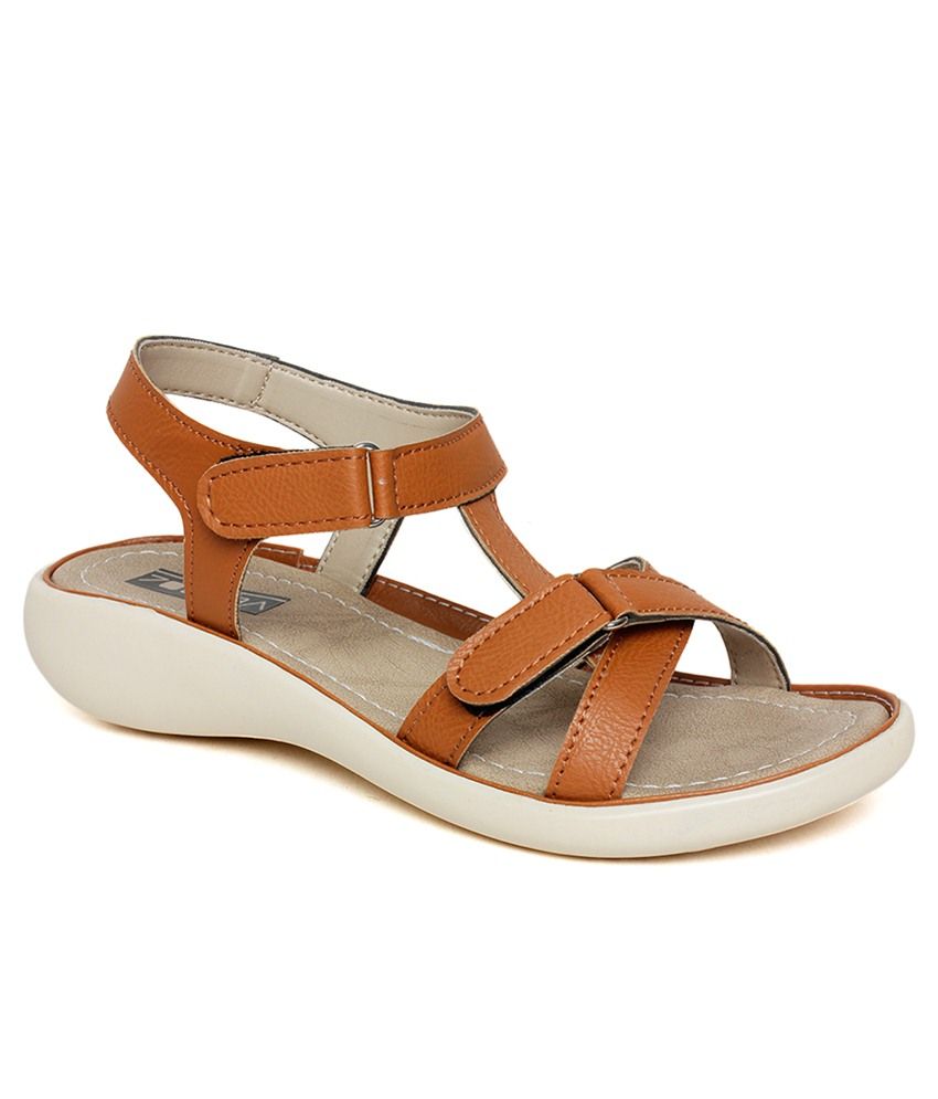 pointy tan flats