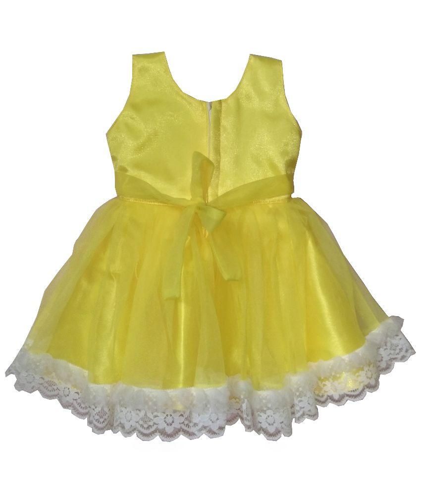 yellow and white party outfit