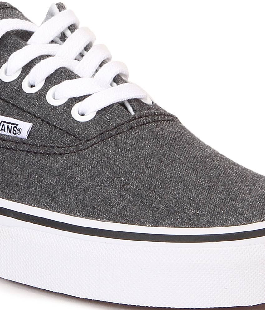 grey and black vans slip ons