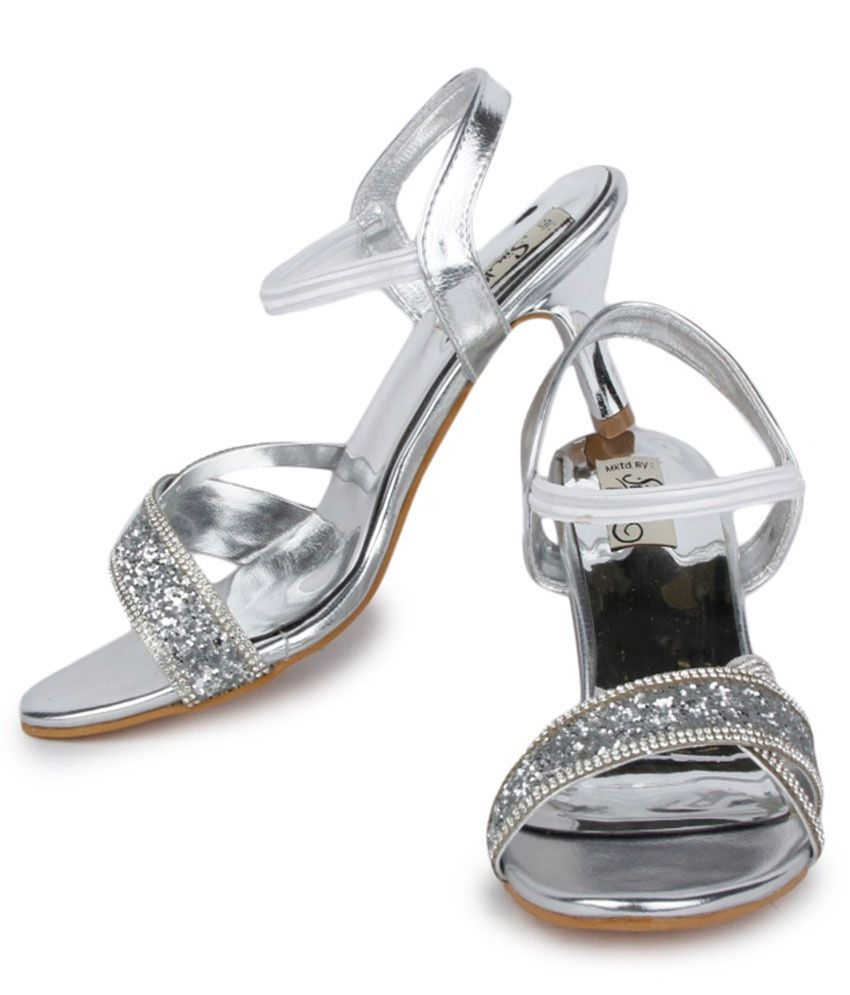 famous footwear silver heels