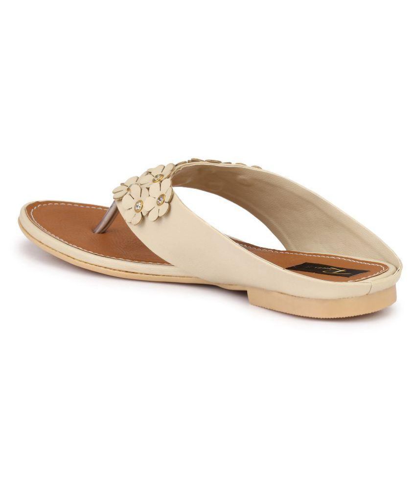 beige flats with black tips