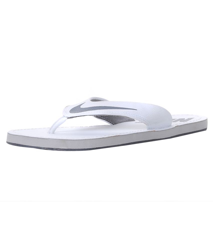 all white nike flip flops