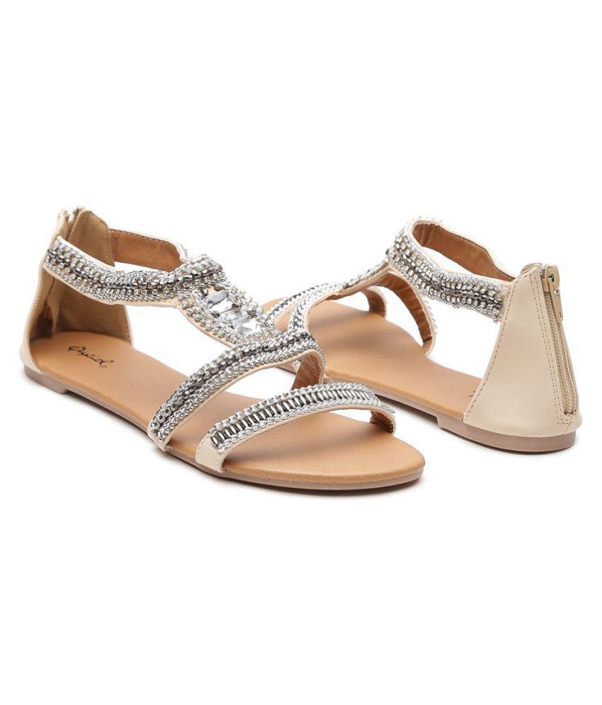 white and silver flats