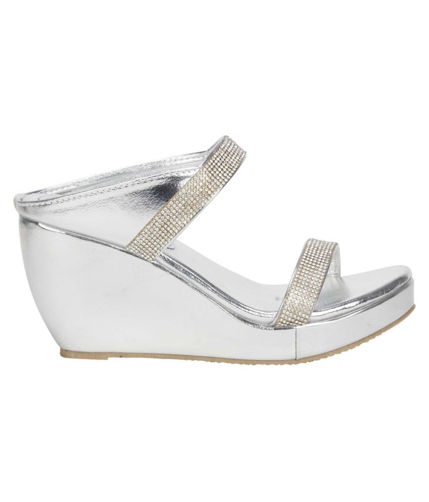 white and silver flats