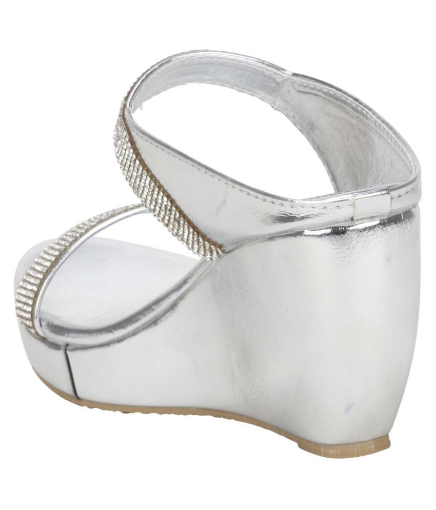 white and silver flats
