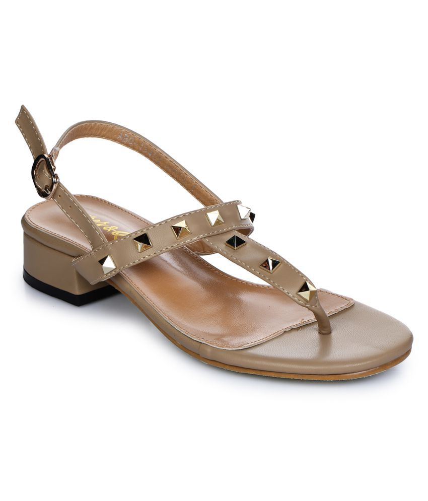 beige flats with black tips