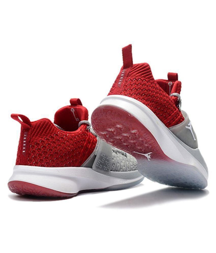 red nike track shoes