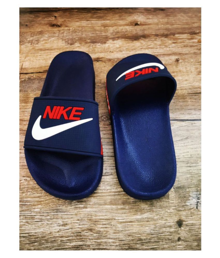 royal blue nike flip flops