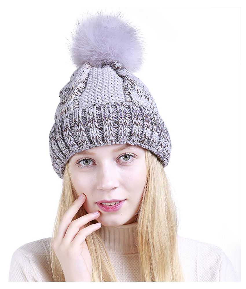 ball on top of winter hat