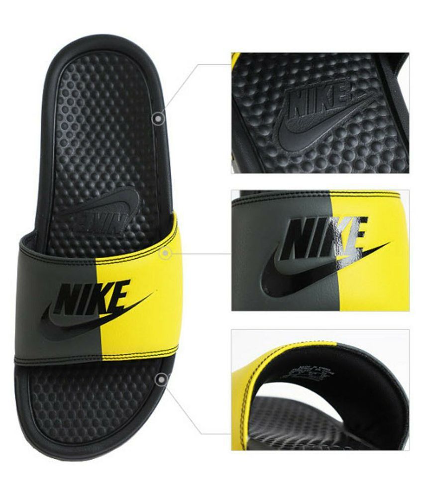 yellow and black nike slides