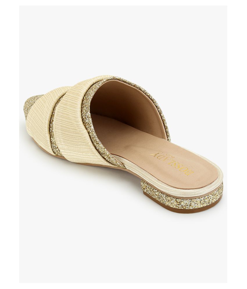 beige flats with black tips