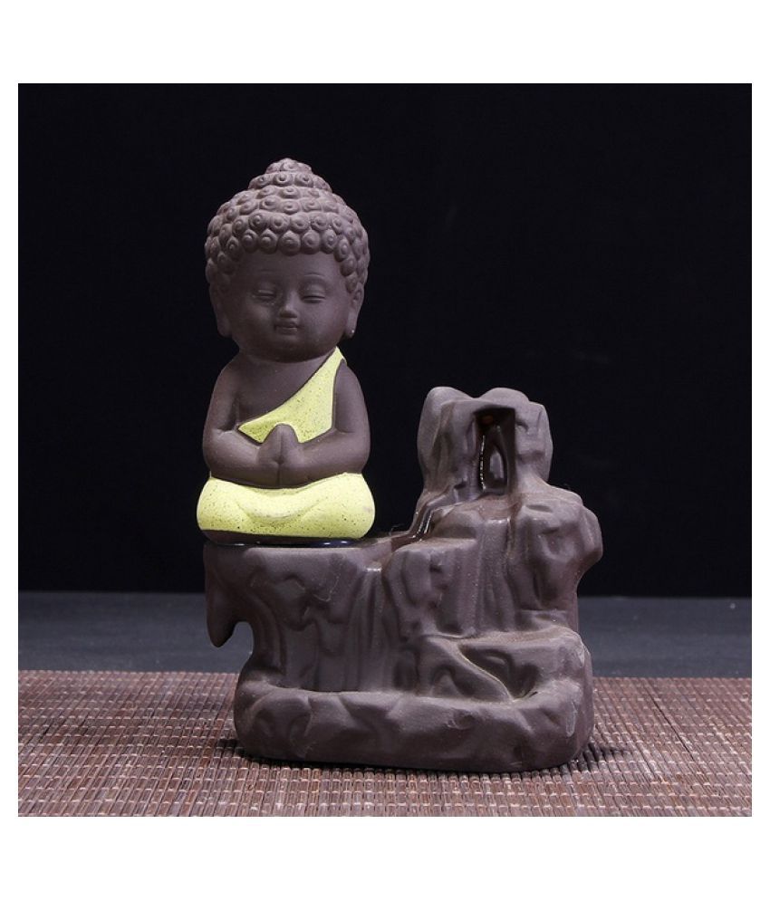     			Yukti Yellow Polyresin Monk Buddha Smoke Backflow - Pack of 1