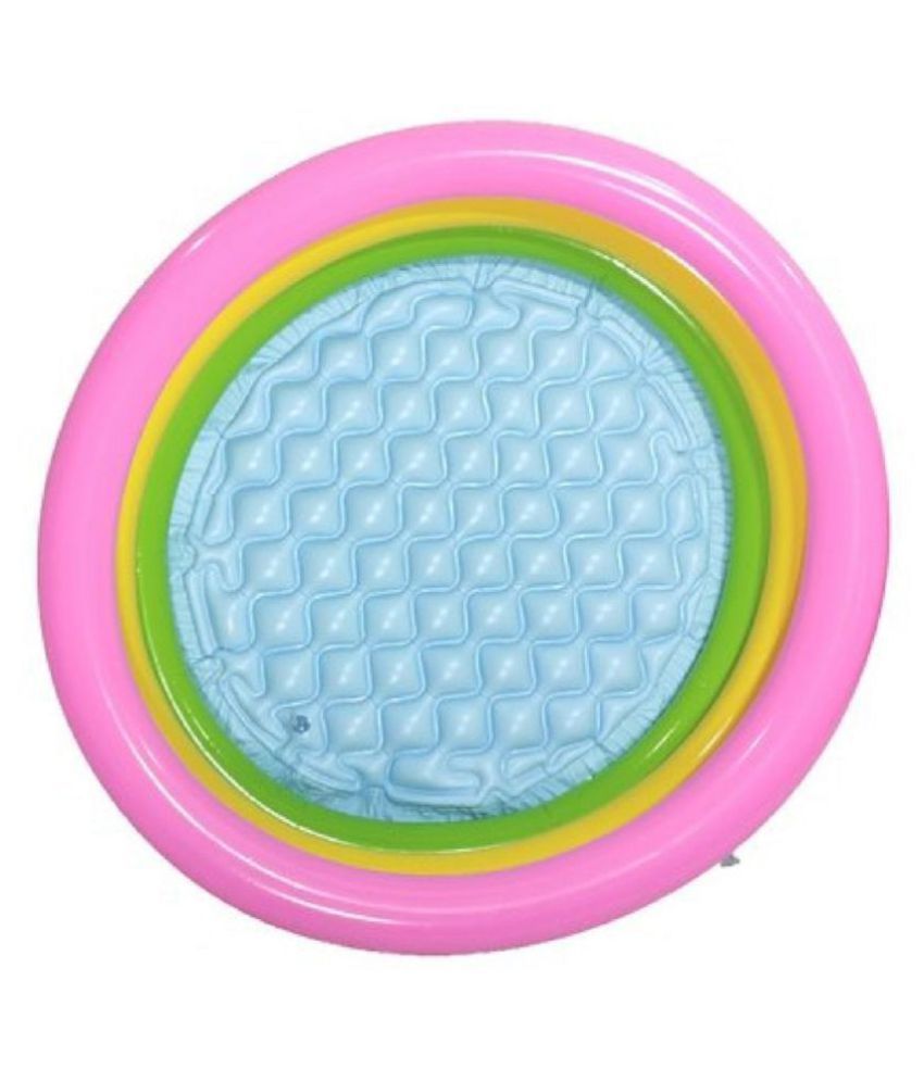 baby holding backpack