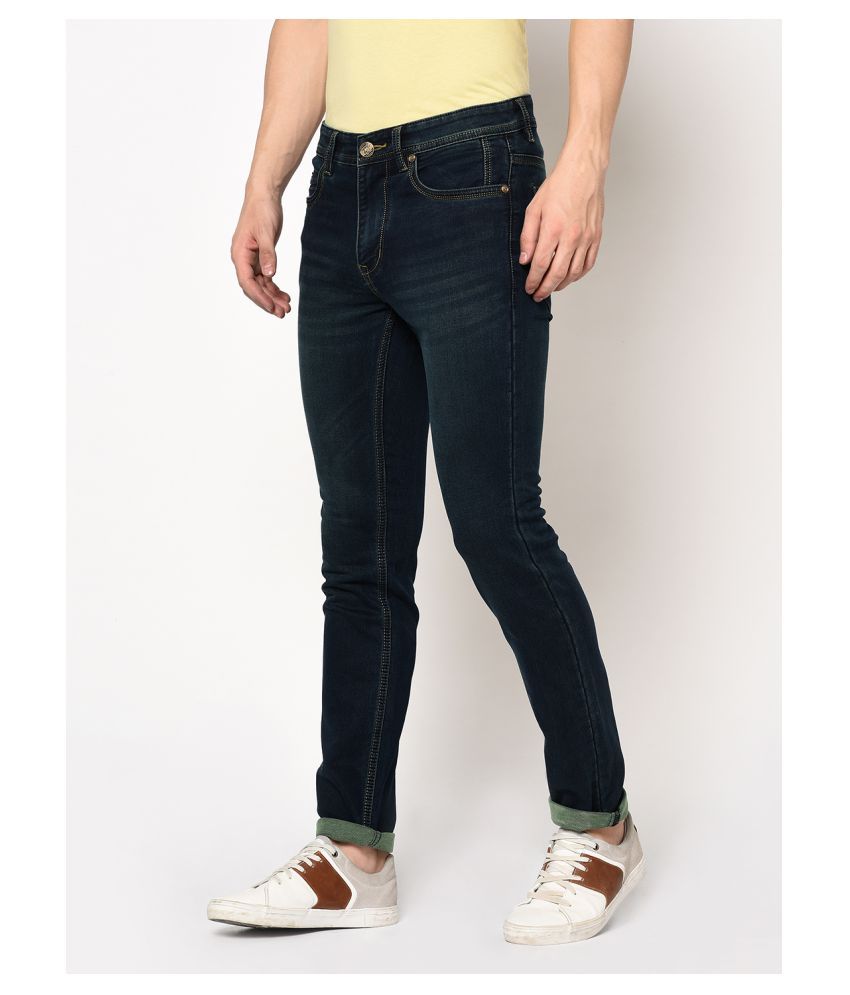 green slim jeans