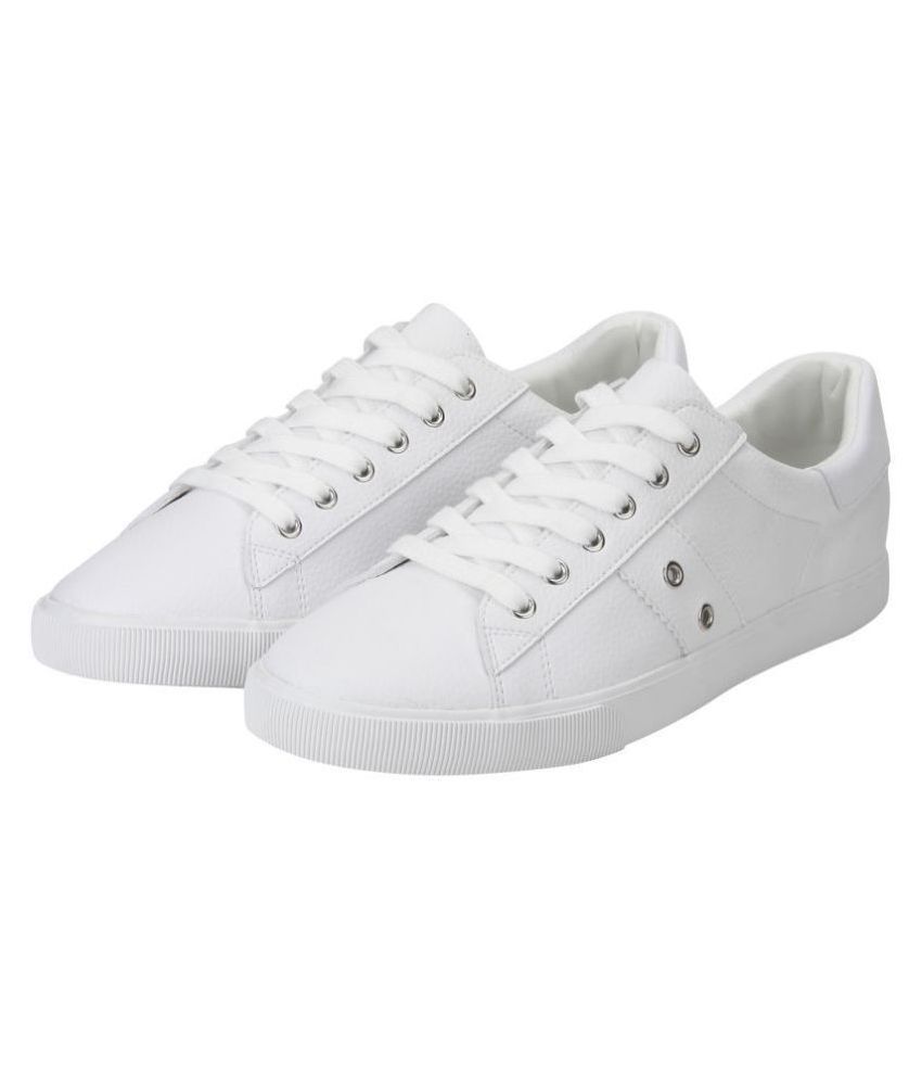 red tape white shoe