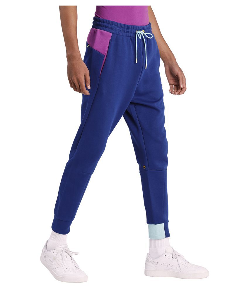 blue nike tech sweatpants