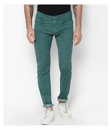 green slim jeans