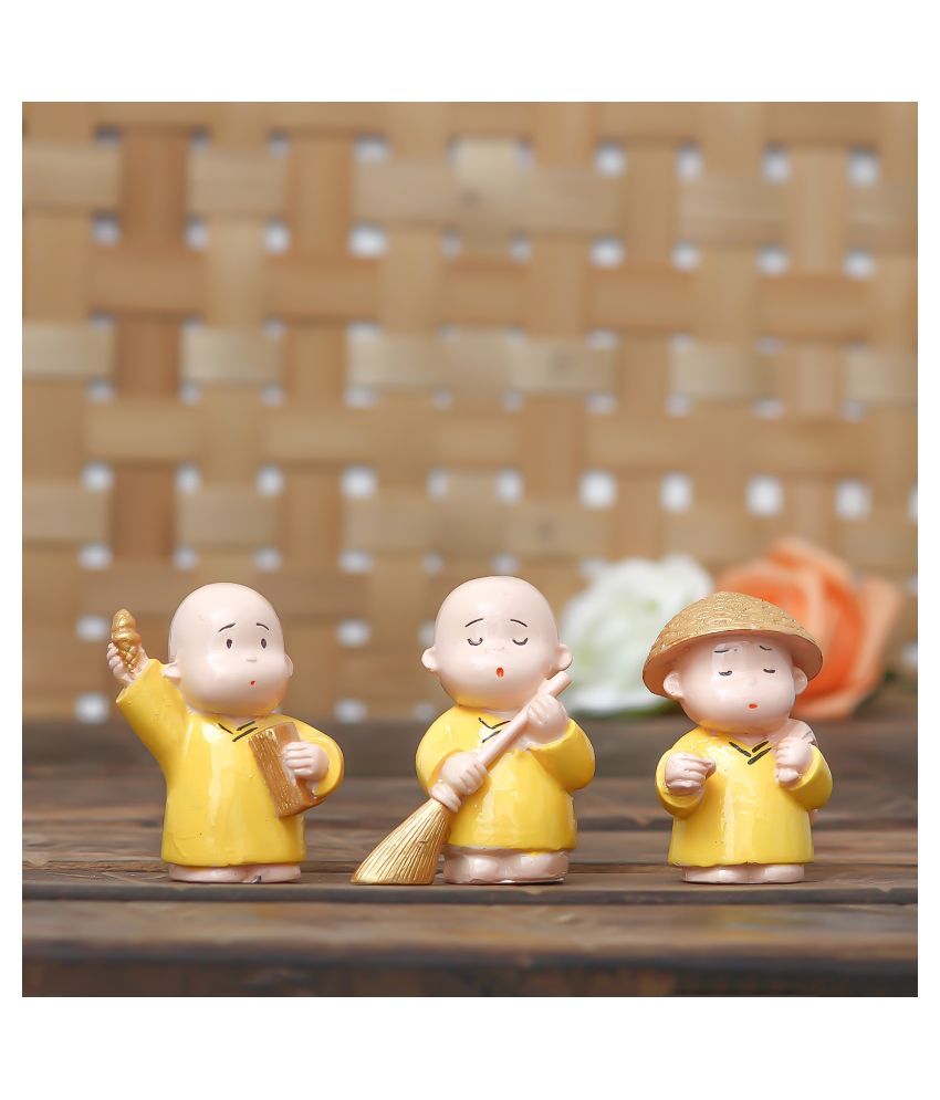     			eCraftIndia Yellow Polyresin Figurines - Pack of 3