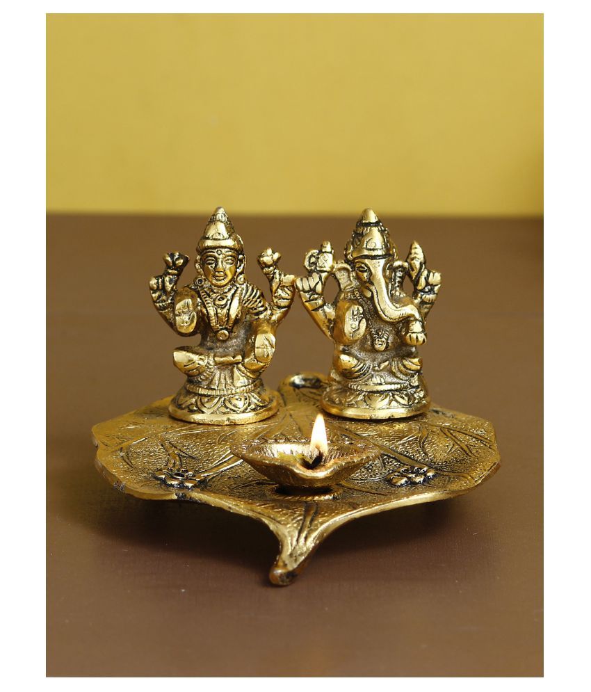     			eCraftIndia Antique Gold-Toned Metal Handcrafted Laxmi Ganesh With Diya On Leaf