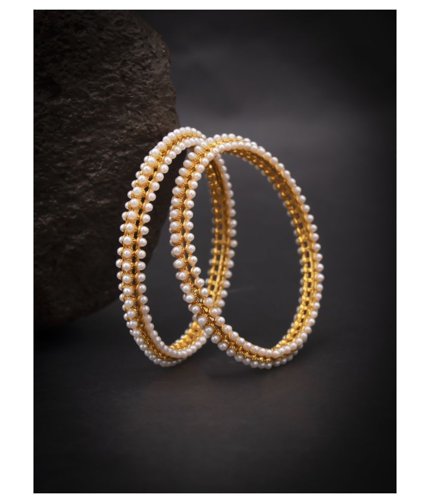     			Sukkhi Pleasing Gold Plated Pearl Bangles For Women