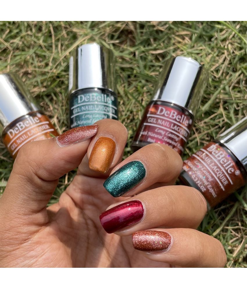     			DeBelle Gel Nail Lacquers Combo set of 4 Sizzlin Skittles - Starry Walnut(Glitter Dark Brown), Aurora (Amber with Copper Glitter), Cosmic Emerald(Glitter Emerald Green), Antares (Deep Maroon) 32ml (8ml Each) Gift for girls