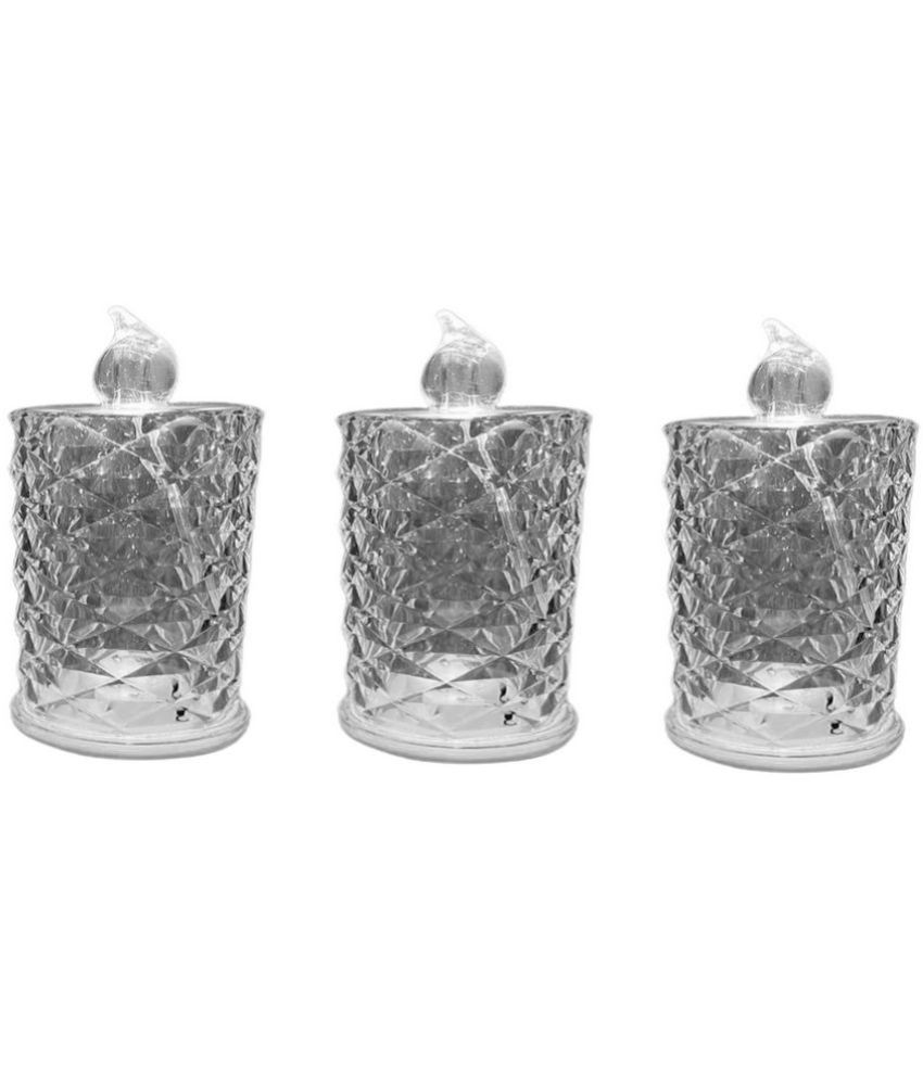     			TINUMS - Off White Acrylic Diwali Candle