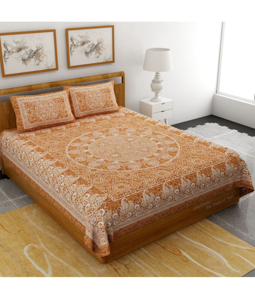     			HOMETALES Cotton Ethnic Double Bedsheet with 2 Pillow Covers - Mustard